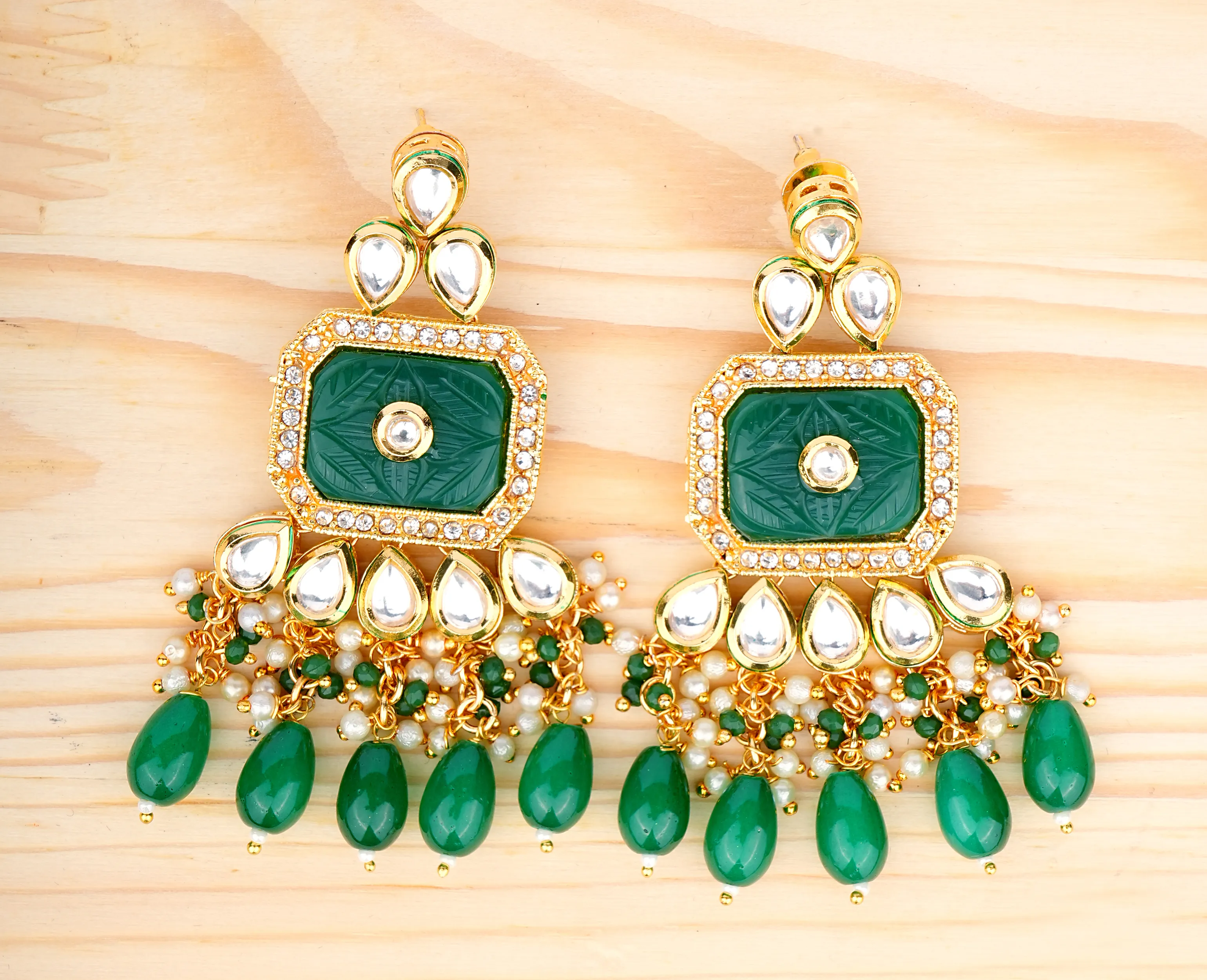 Kundan Carved Emerald Earrings – A Timeless Statement of Royal Elegance